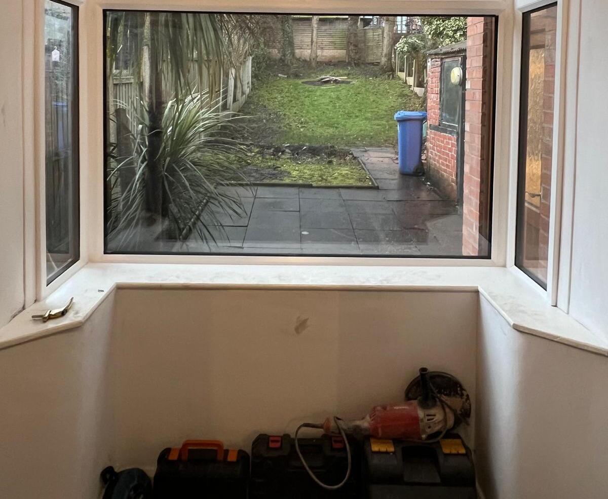 Technician wearing PPE for safe spraying