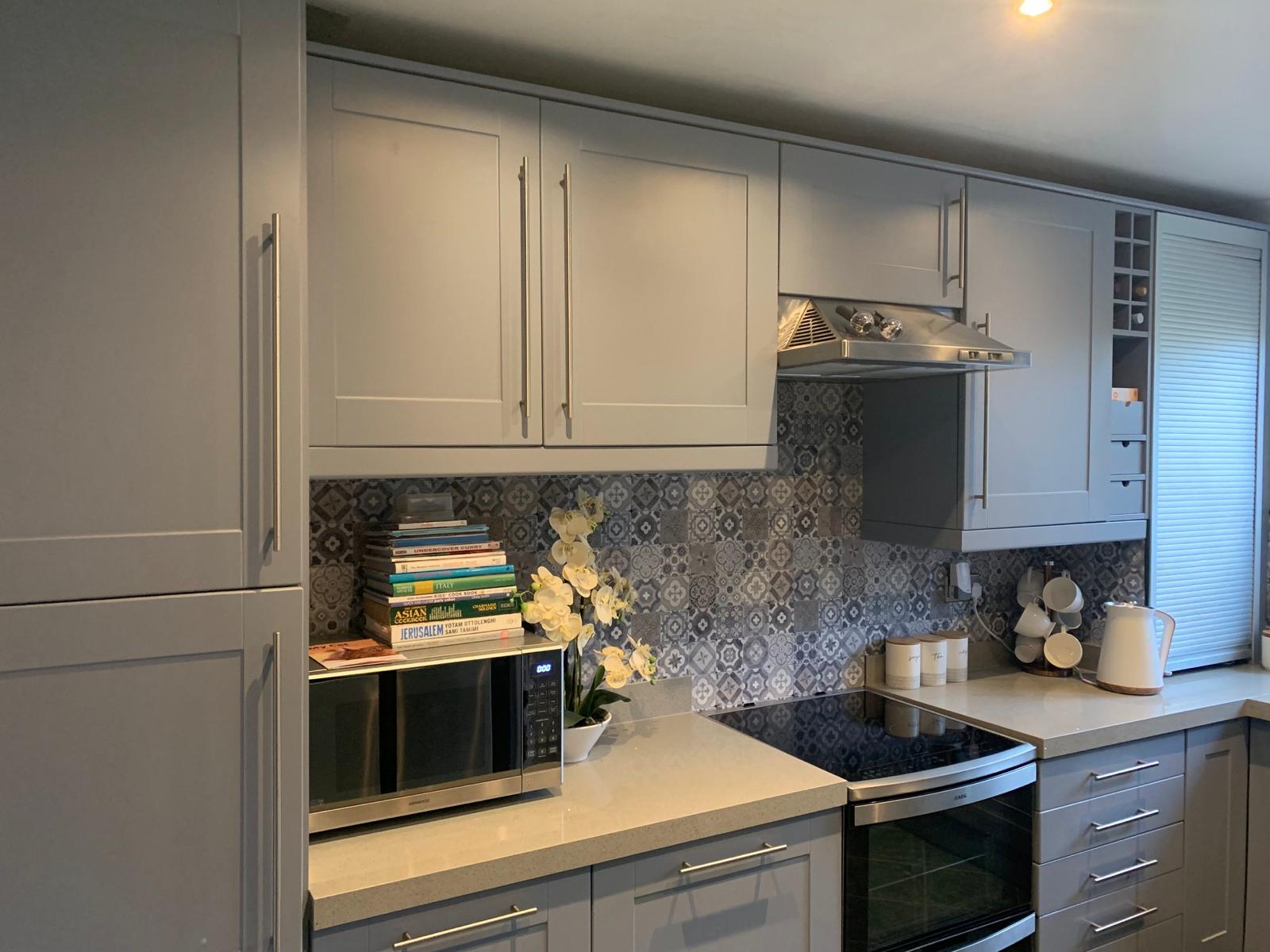 A beautifully sprayed kitchen cabinet